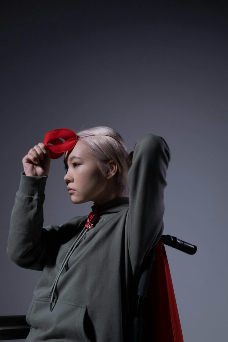 Image of woman reclaiming identity and removing mask